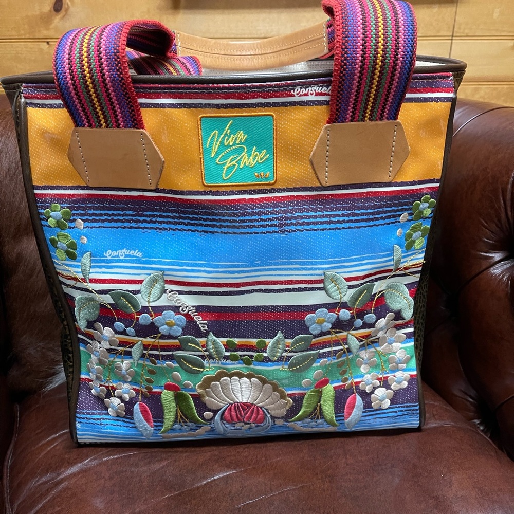 Gorgeous retired Consuela Classic Tote with embroidery and a few patches added.
